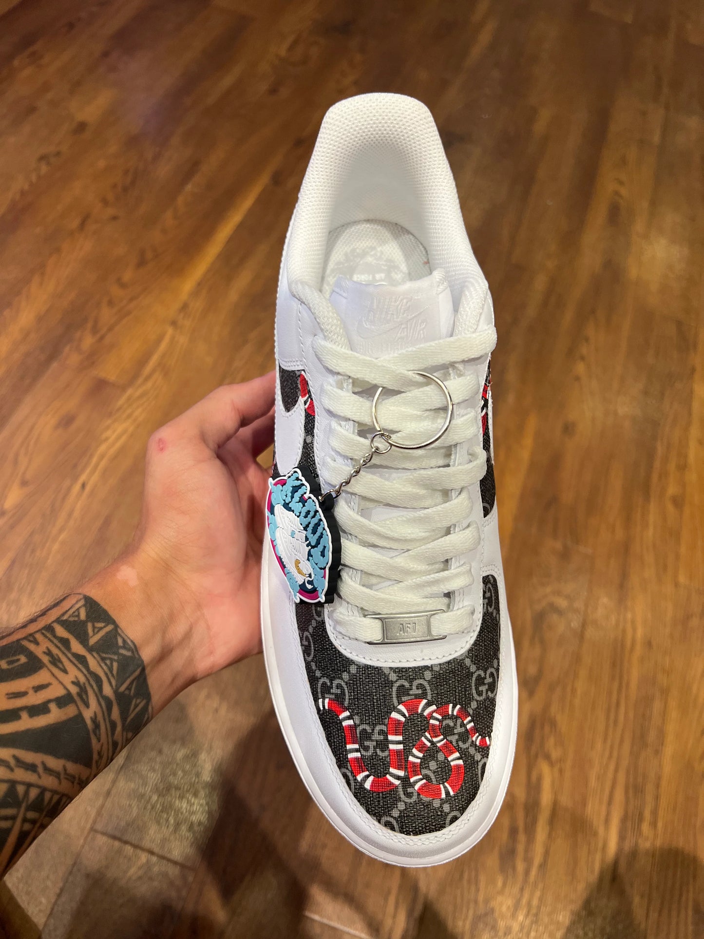 Custom White & Black Pattern Low-Top Sneakers with Red Snake Detail