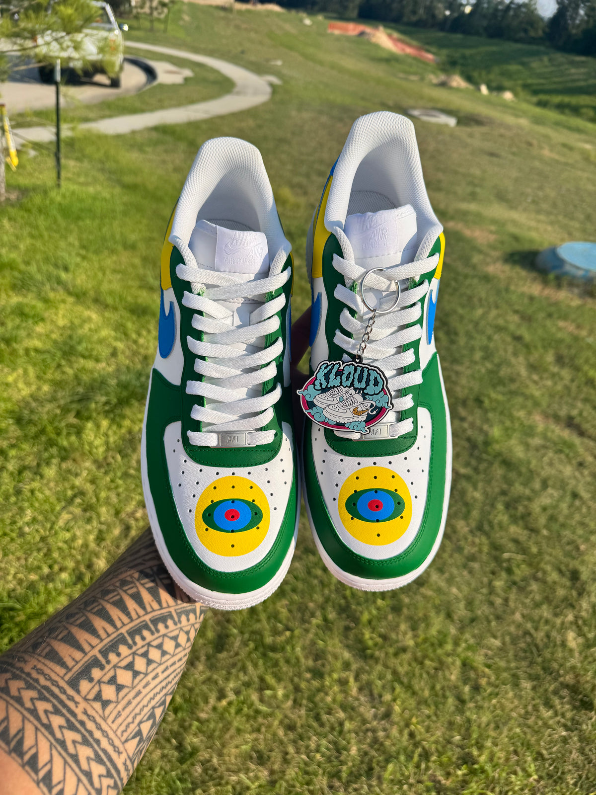 Custom Brazil Flag-Inspired "Rebel Natural" Court Sneakers – Hand-Painted Green, Yellow & Blue Low-Tops with Concentric Circle Toe Box Design, Blue Swoosh & Stripe Script